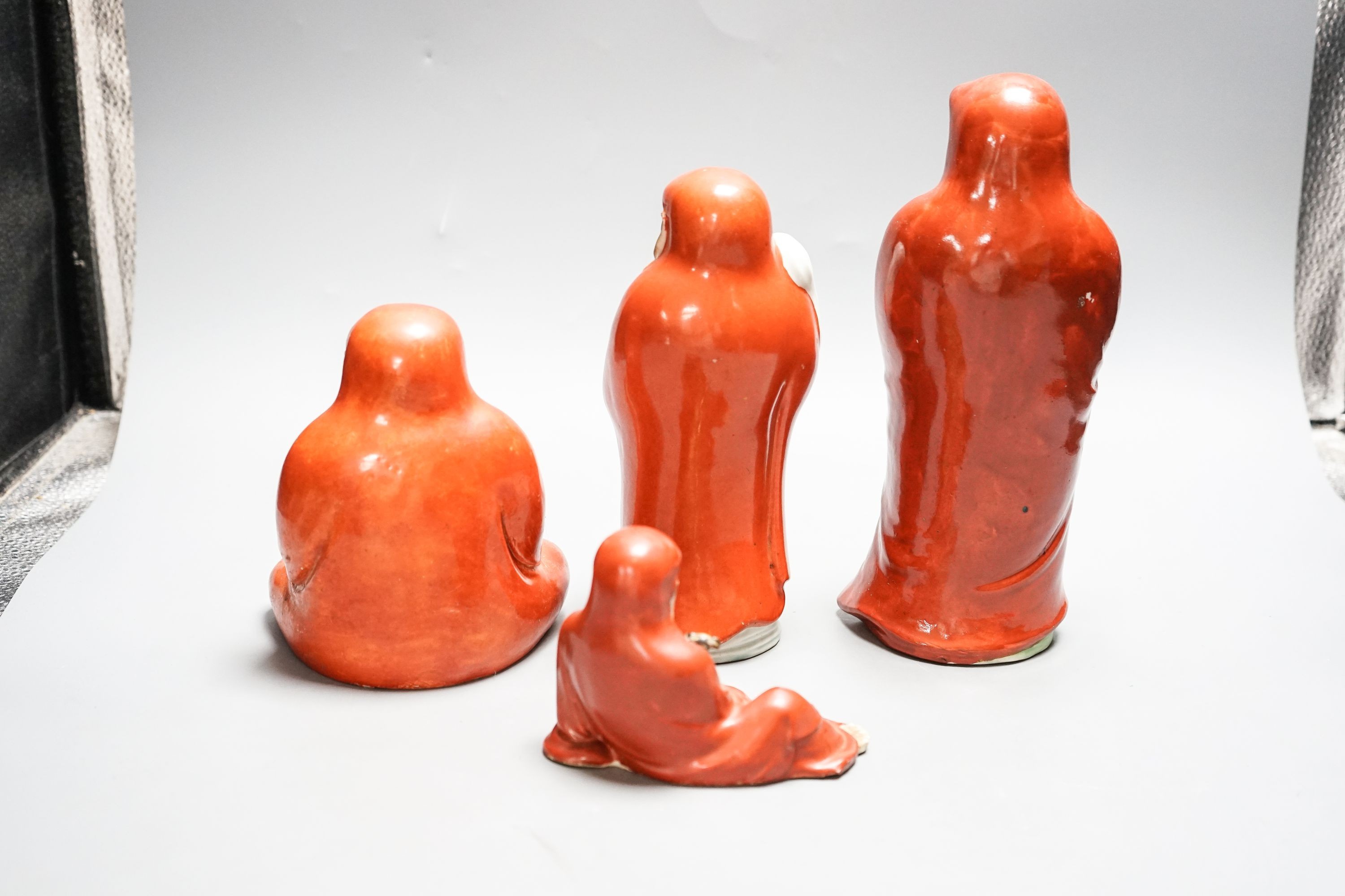 Four Chinese or Japanese porcelain figures of Luohan 25cm